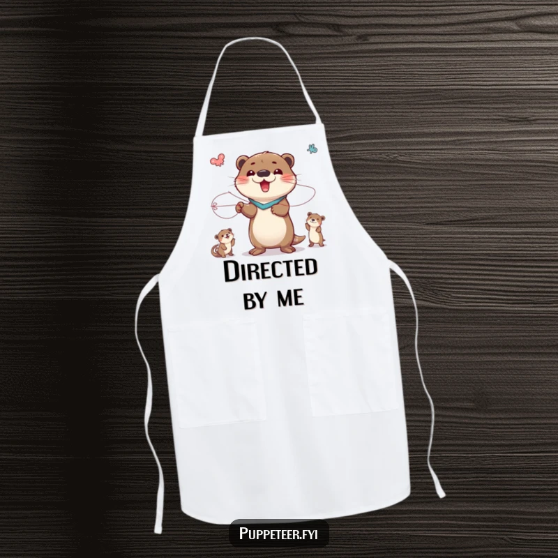 Funny apron featuring a delighted otter character masterfully posing and controlling animal puppets with strings, ready for kitchen command.