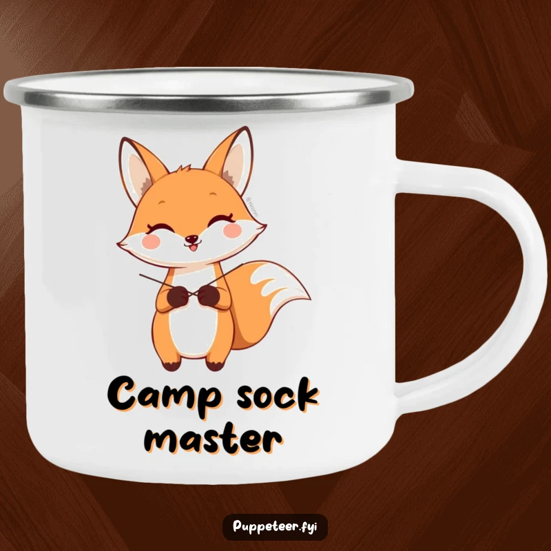 Funny camping mug featuring a happy fox character controlling a sock puppet’s wave, great for outdoor humor.