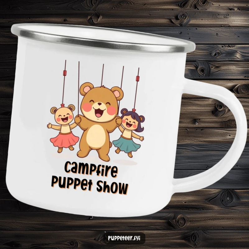 Funny Camping Mug featuring a delighted bear cub controlling puppets, perfect for outdoor adventures and humorous enjoyment.