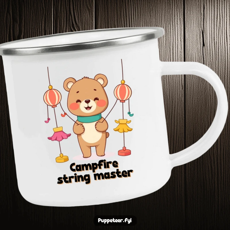 Funny camping mug showing a smiling bear character controlling dancing puppets with strings, ideal for outdoor humor.