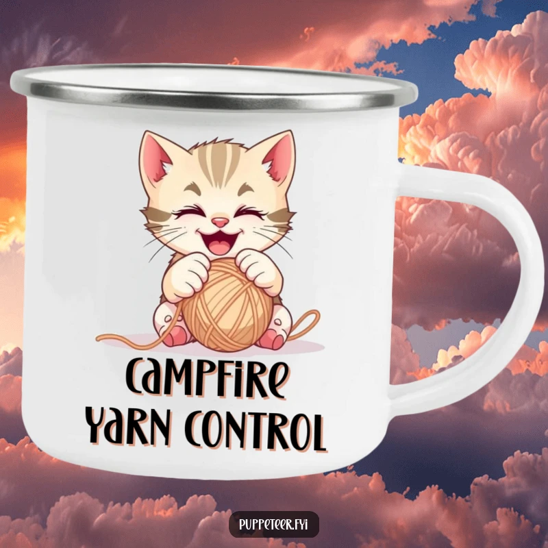 Funny mischievous kitten camping mug with gleeful paws controlling a ball of yarn, for playful outdoor adventures.