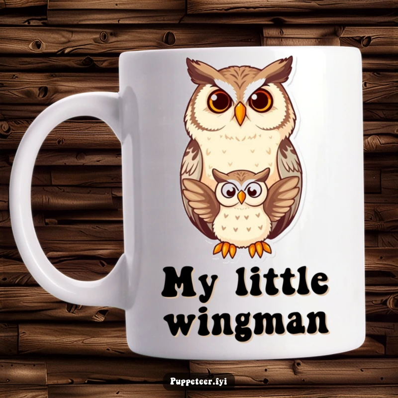 Funny owl mug featuring a wise owl contentedly watching a small owl puppet flap its wings with charming comedic effect.