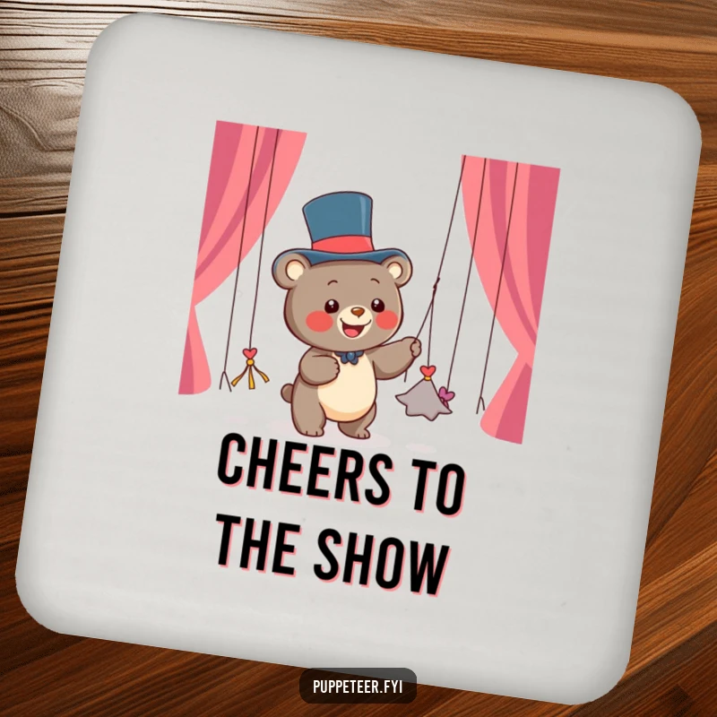 Funny coaster featuring a happy bear cub in a top hat pulling dancing string puppets, adding whimsical decor to any surface.