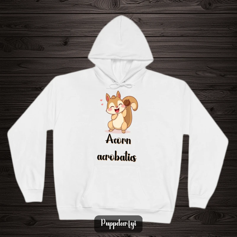 Funny hoodie of a giggling squirrel making a nut puppet perform a somersault, designed for cozy comfort and playful style.