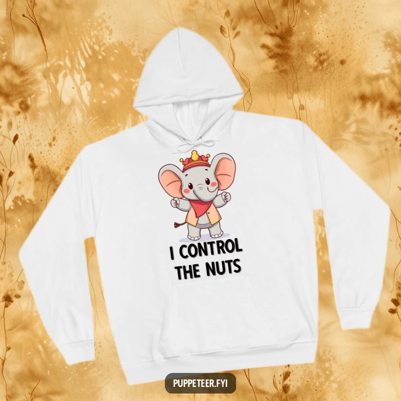 Funny hoodie with a cheerful elephant puppet master orchestrating a proud march for a peanut puppet, exuding warmth and amusement.