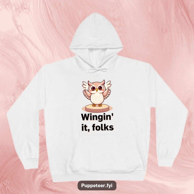 Funny hoodie showcasing a cheerful owl bathed in a spotlight, its wings elegantly gesturing, embodying a spirit of grand performance.