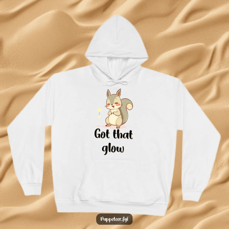 Funny hoodie featuring a giggling squirrel artfully controlling glowing orbs with its tail, a symbol of playful enchantment and comfort.