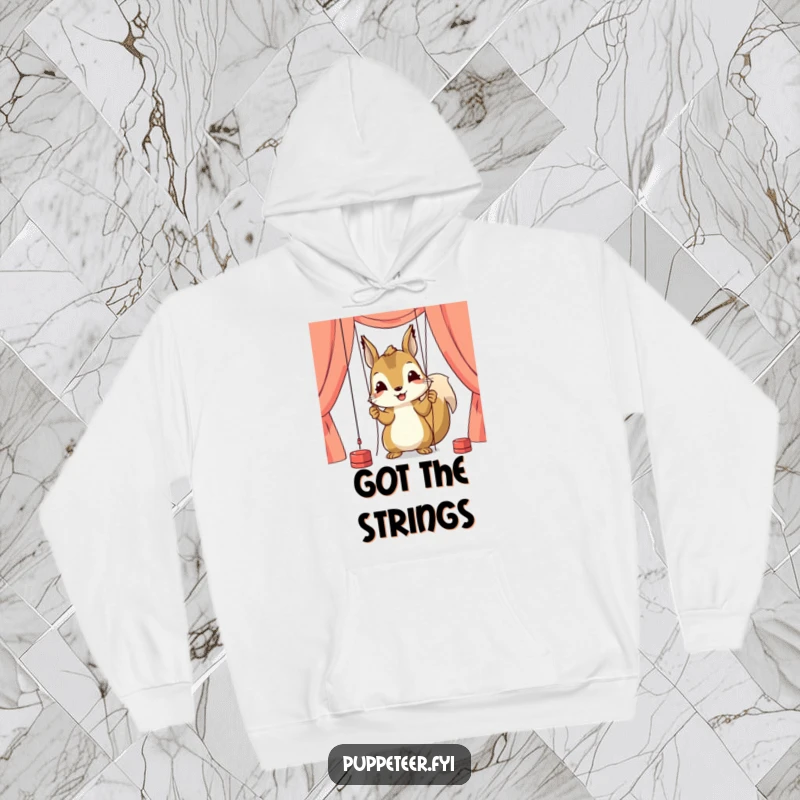 Funny hoodie showing a happy squirrel character engrossed in adjusting puppet strings, highlighting its deep focus and crafting skills.