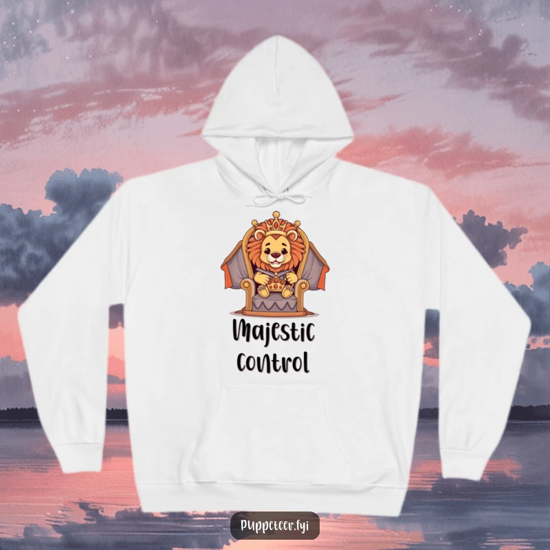 Funny hoodie depicting a proud lion puppet master on a throne, directing a small crown puppet, designed for regal relaxation.
