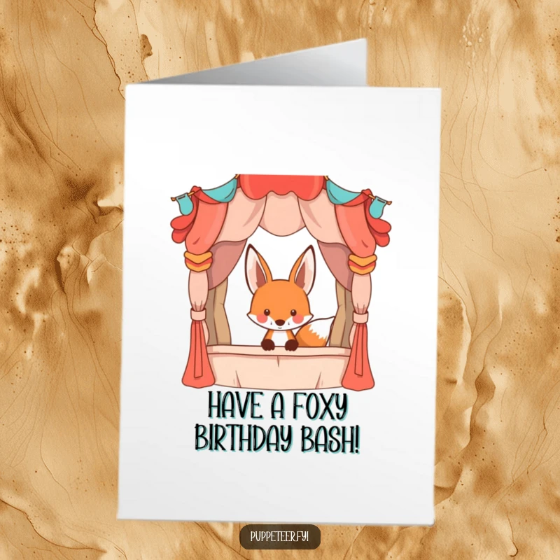 Funny Free Printable Birthday Card: A playful fox peeking from behind a whimsical, colorful puppet stage.