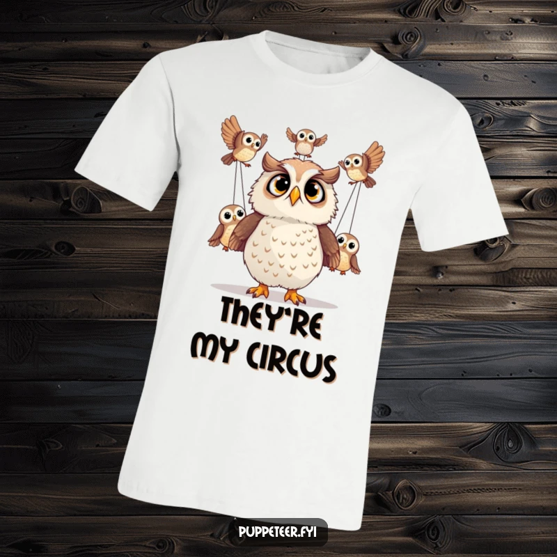 Funny t-shirt showing a startled owl gazing upwards as its puppet counterparts execute impressive acrobatics.